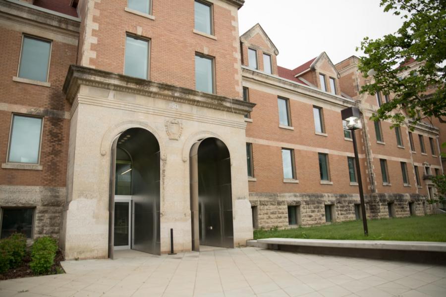 The main front entrance of the Tache Hall building.