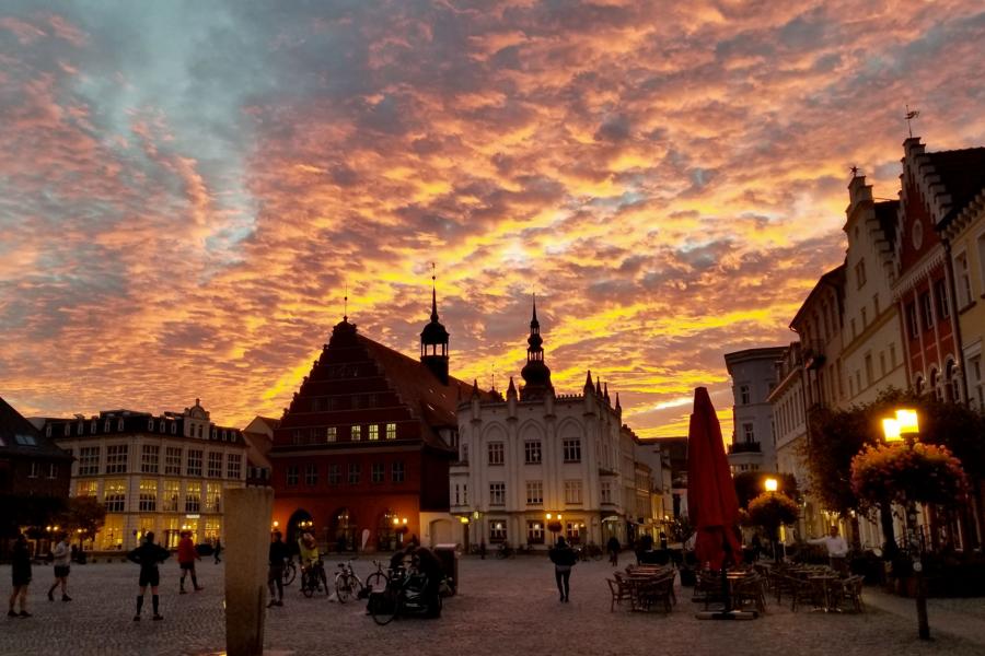 Greifswald Market Square in Greifswald, Germany, at sunset.