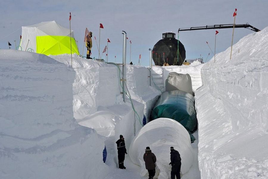 image of researchers building a snow tunnel