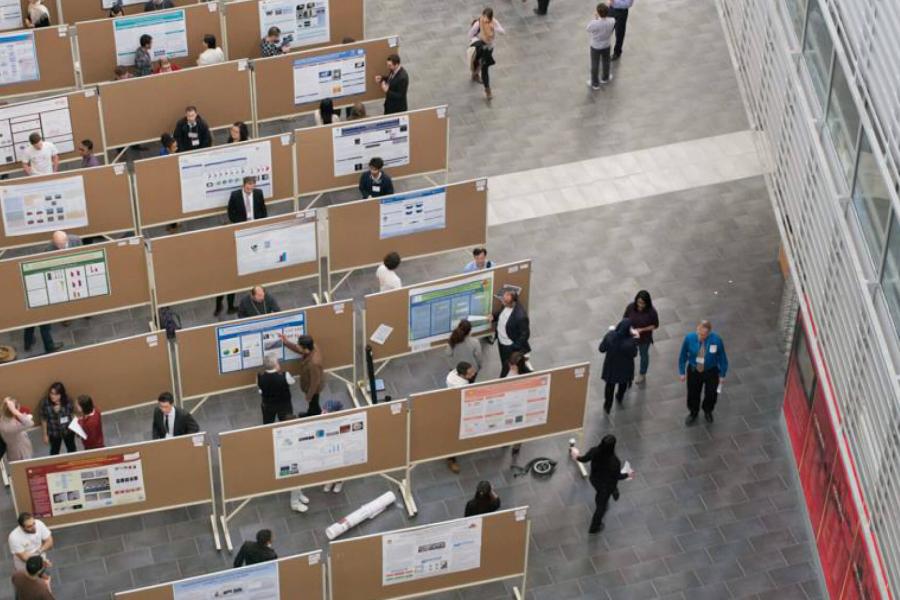 A student poster competition on display inside the atrium of the engineering complex.
