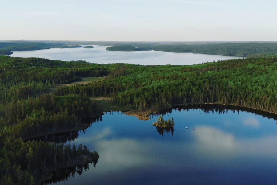 An overhead view of black lake.
