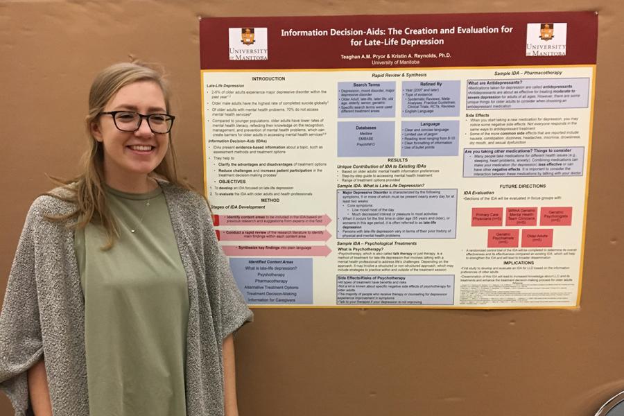TEAGHAN PRYOR AT THE 2017 UNDERGRADUATE RESEARCH POSTER COMPETITION.