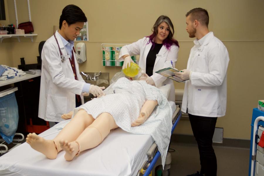 Residents in a simulation lab.