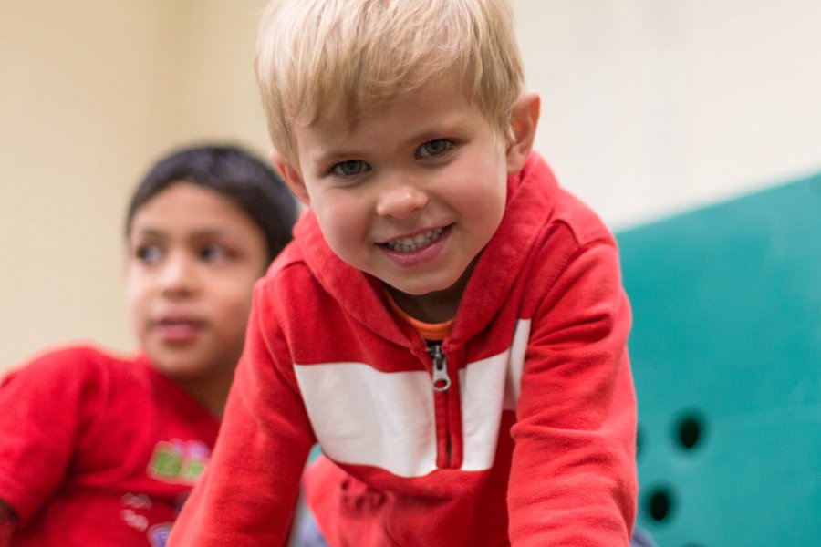 A young Mini U participant playing.