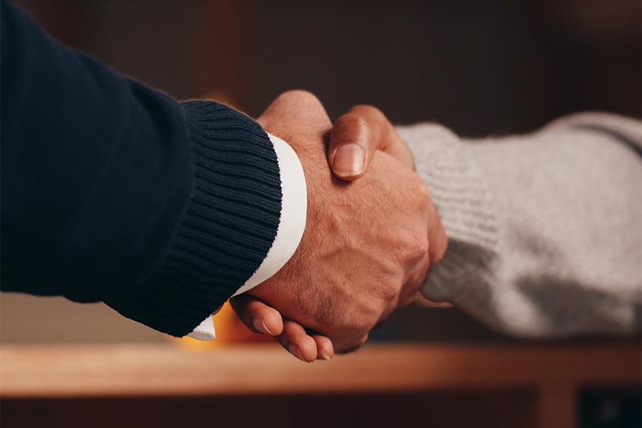 A photo of a handshake.