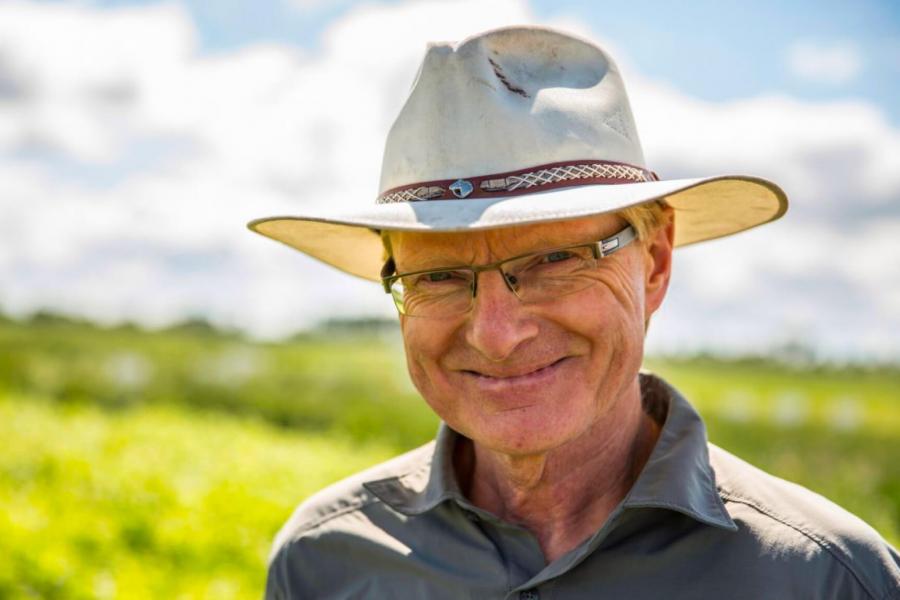 Martin Entz standing in a field.