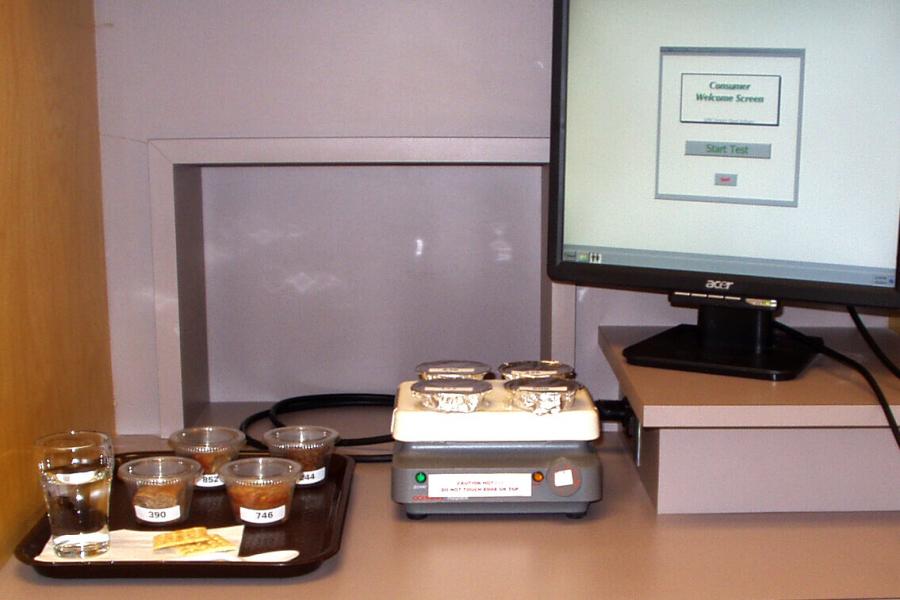 Food samples sit by a computer screen.