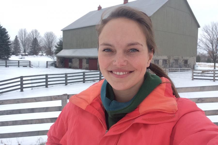 Dr. Meagan King in front of a barn