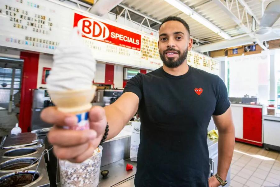 BDI owner holds a lupin cone