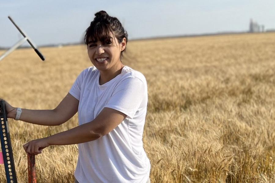 Faezah working in the field