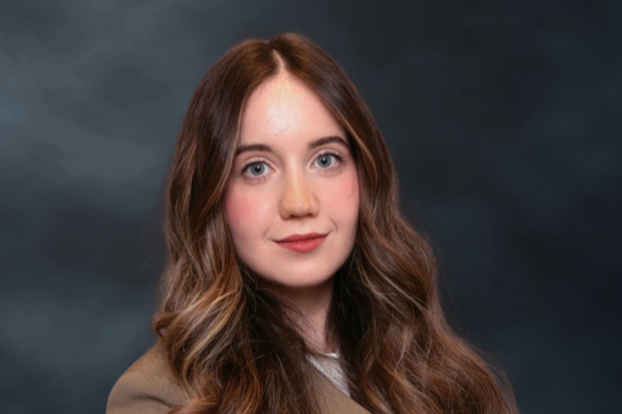 A headshot of a Tali Riman