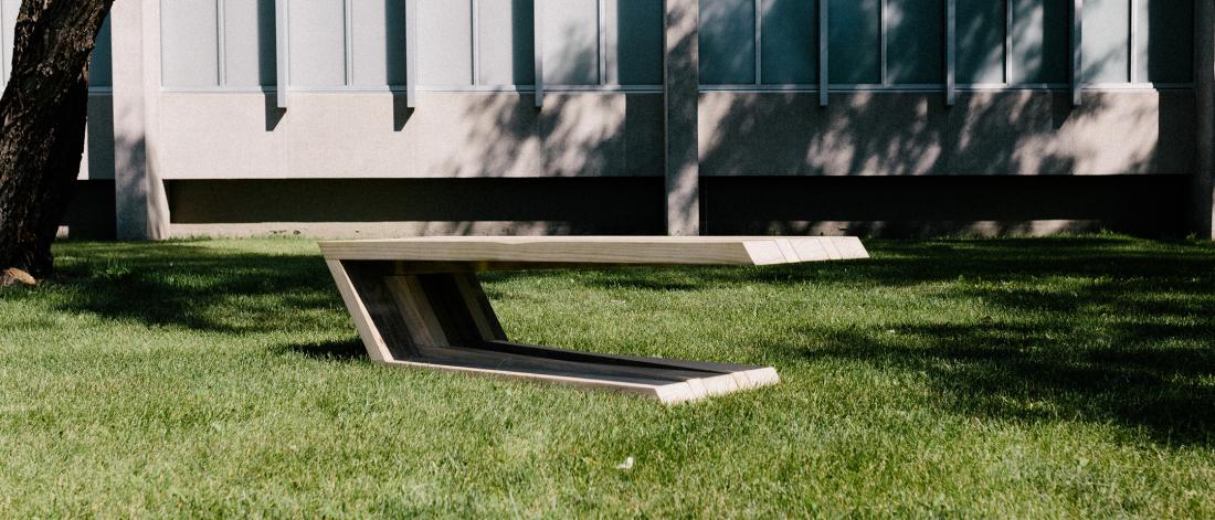 A cantilevering bench made from Accoya wood, designed by Faculty of Architecture students and alumni.