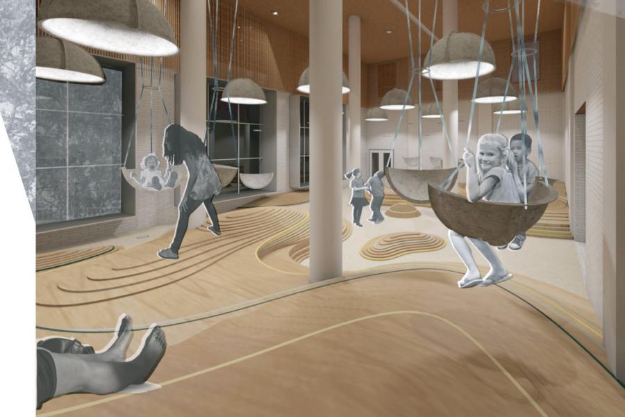 An interior view of a room with several children sitting in swings and an adult plays with one of the children.