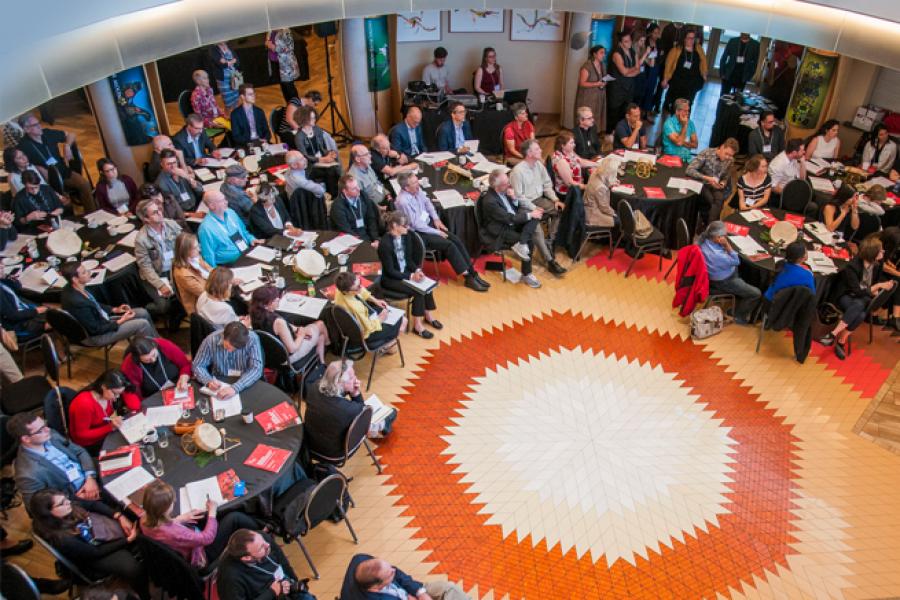 a crowd sitting in a circle