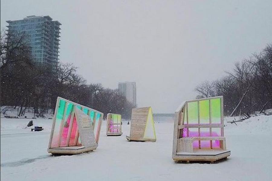 series of warming huts on the river