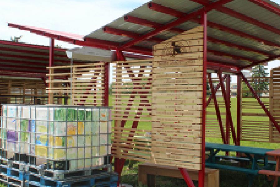 two Rainbow Garden sheds outside