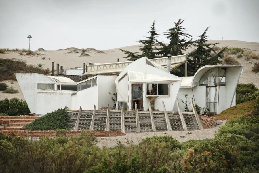 White curvy building in desert