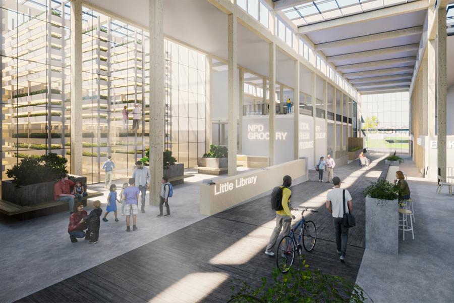 Interior Street with a view of the vertical farm and the local grocery store.