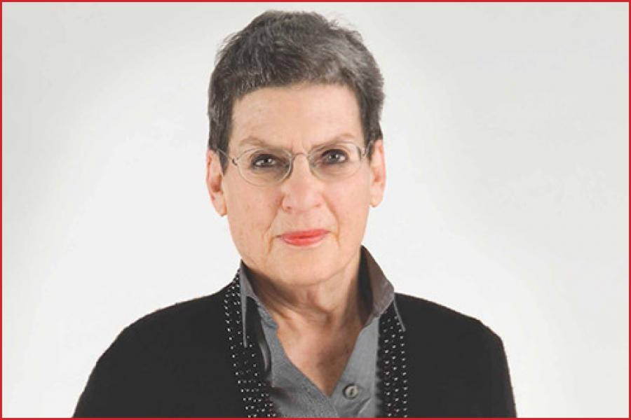 bio image of distinguished looking women in glasses with short grey hair