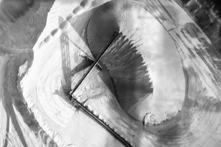 Black and white aerial image of clay landscape.