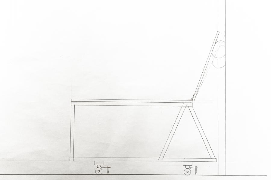 Drafted elevation of a chair on wheels.