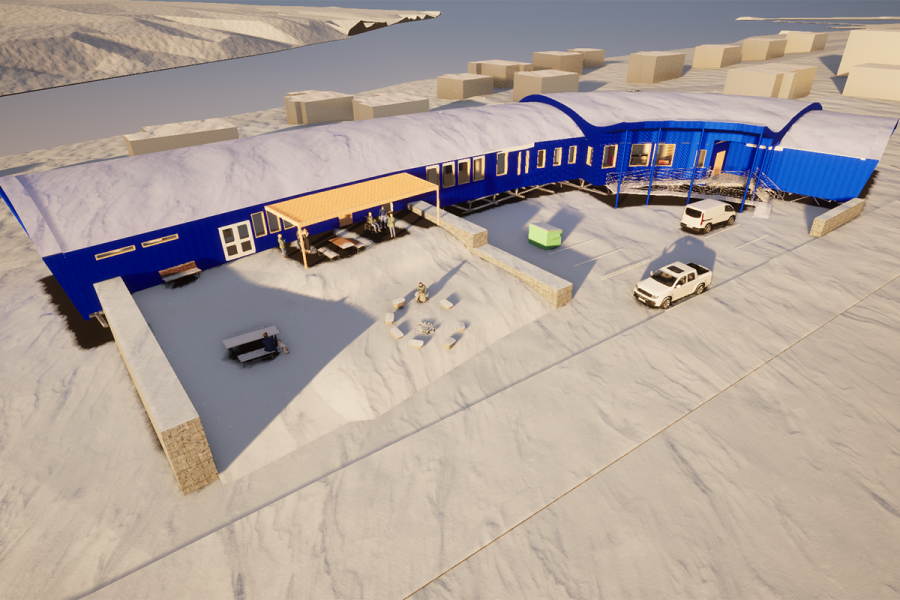A blue building with cars parked in the snow