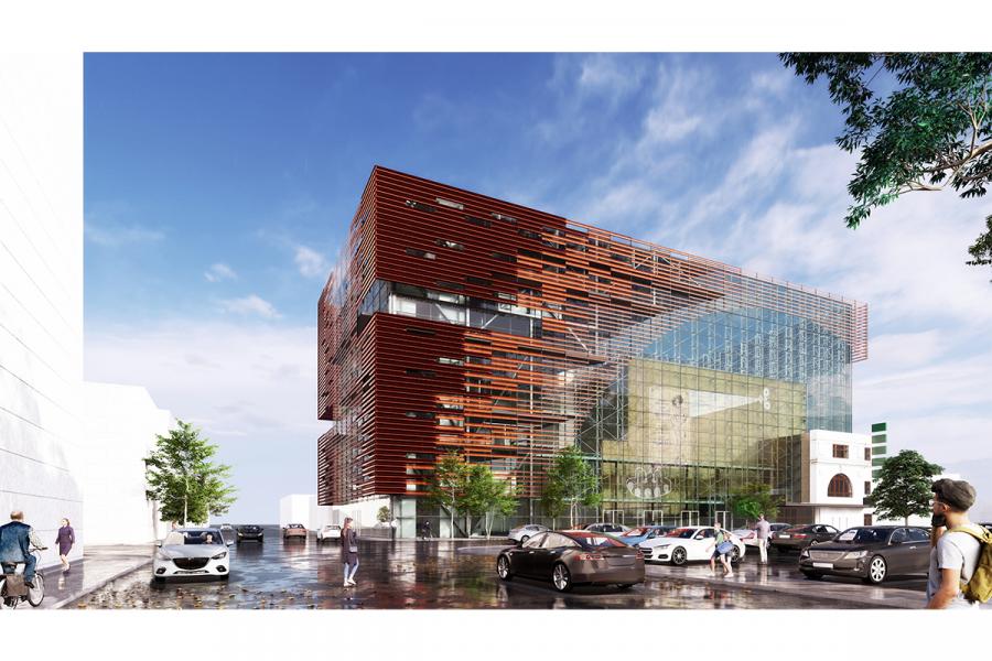 A building with a large parking lot in front