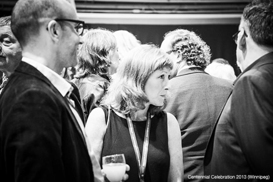 People gather and socialize at an event