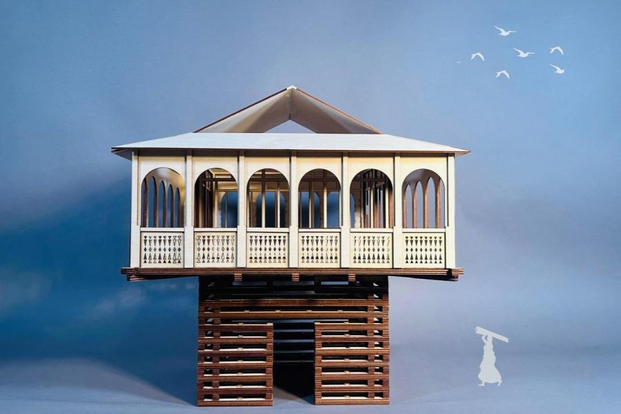 Model of an elevated, open-air pavilion with arched windows and intricate lattice work, set against a serene blue sky with flying birds.
