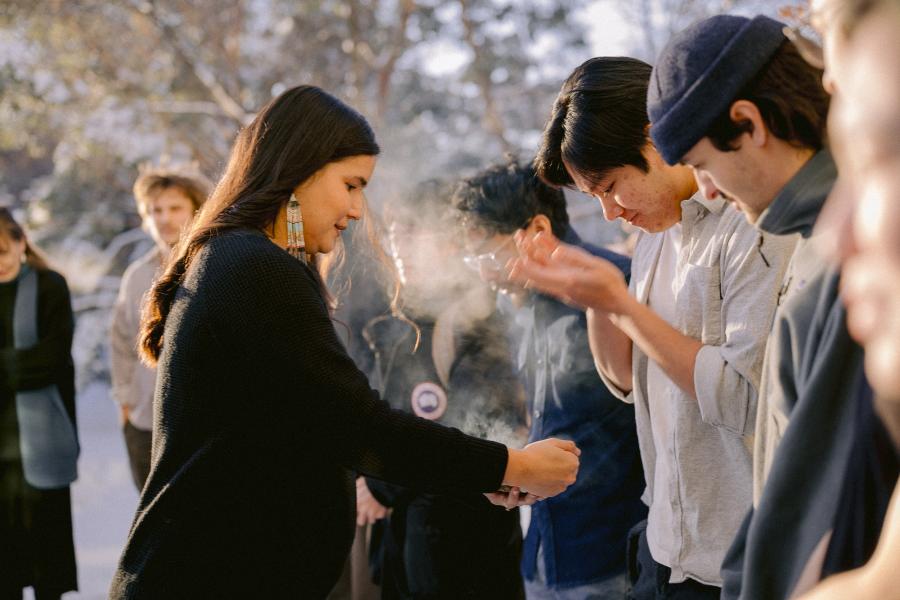 smudge bowl being passed to participants