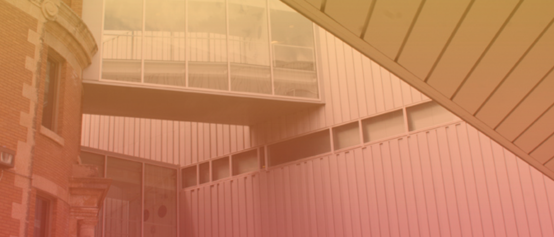 A modern building with an orange tint overlay