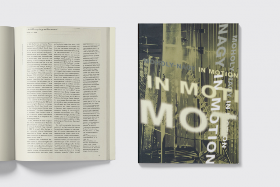 Book cover reading "Moholy-Nagy and Biocentrism" beside an open book with article text too small to read.