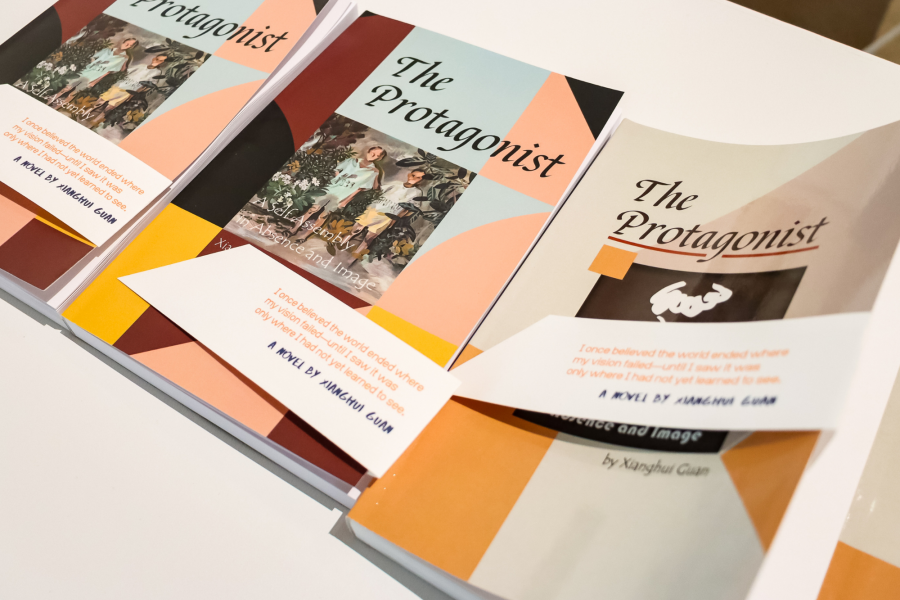 Exhibition booklets for Xianghui Guan’s MFA thesis show "The Protagonist," titled “A Self-Assembly of Absence and Image,” featuring cover images of Guan’s paintings and an epigraph about perception.