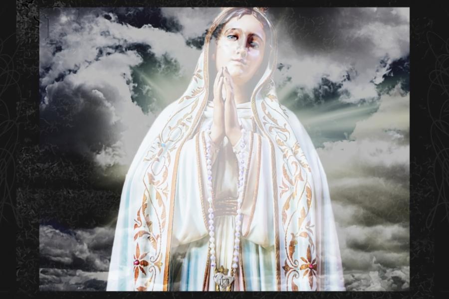 A stylized image of the Virgin Mary in prayer, set against a dramatic cloudy sky with rays of light shining through.