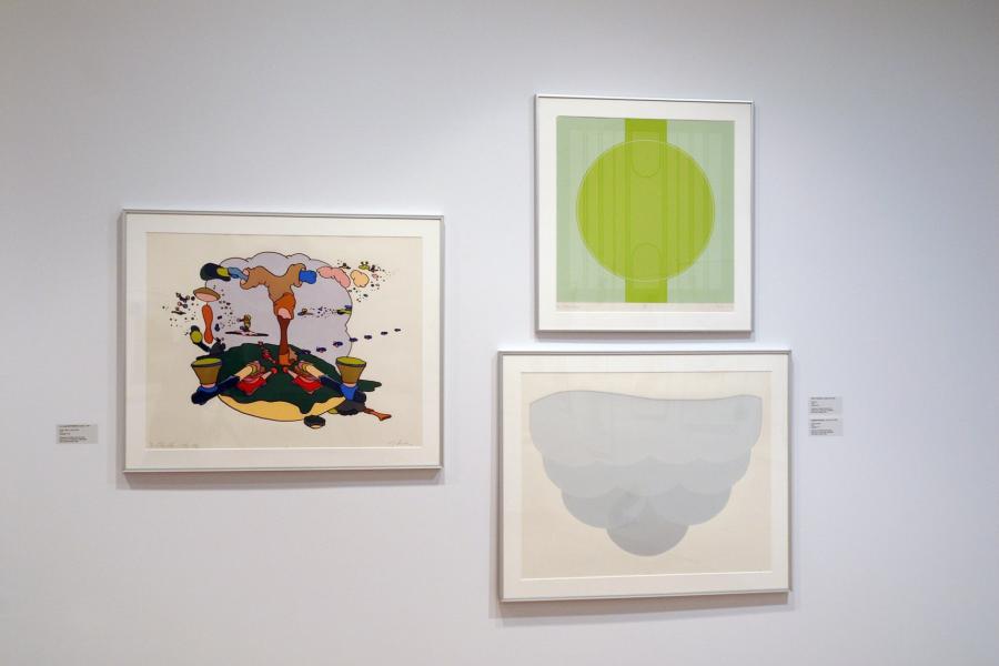 Three framed screen prints with abstract and geometric compositions displayed on a gallery wall.