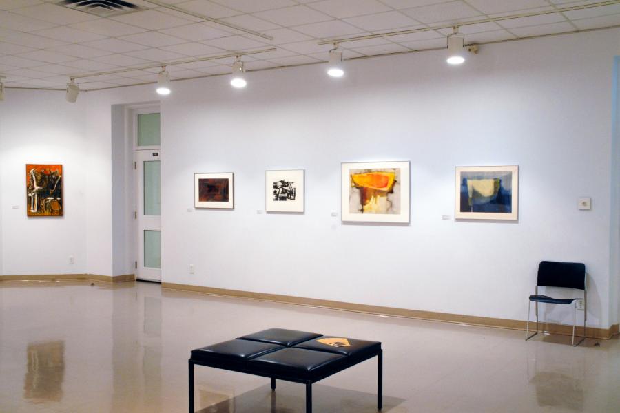 Gallery view showing abstract paintings and prints installed throughout the exhibition space.