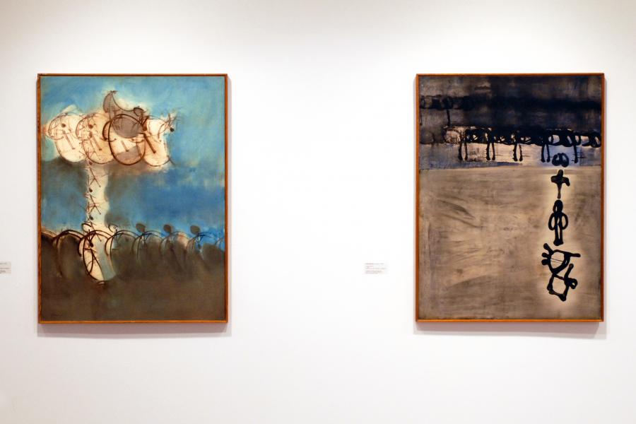 Two abstract paintings by Frank Mikuska displayed side by side on a gallery wall.