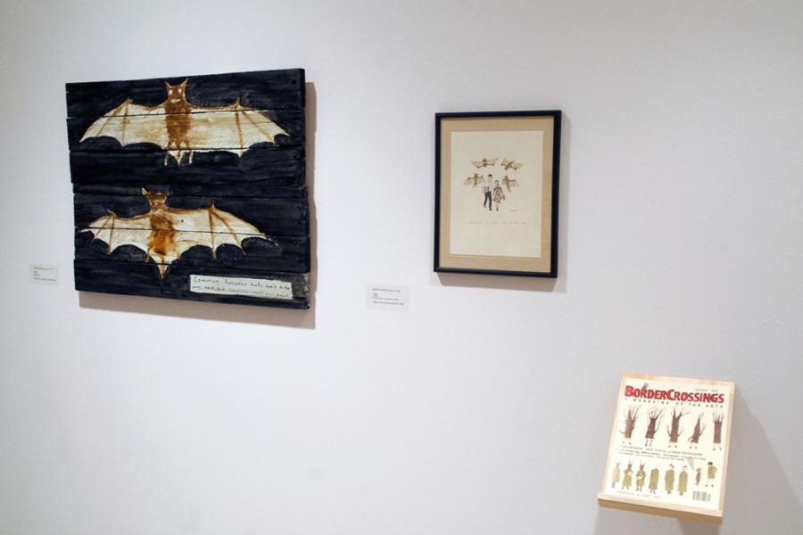 Works by Aganetha Dyck displayed alongside a Border Crossings magazine issue featuring related artwork on its cover.