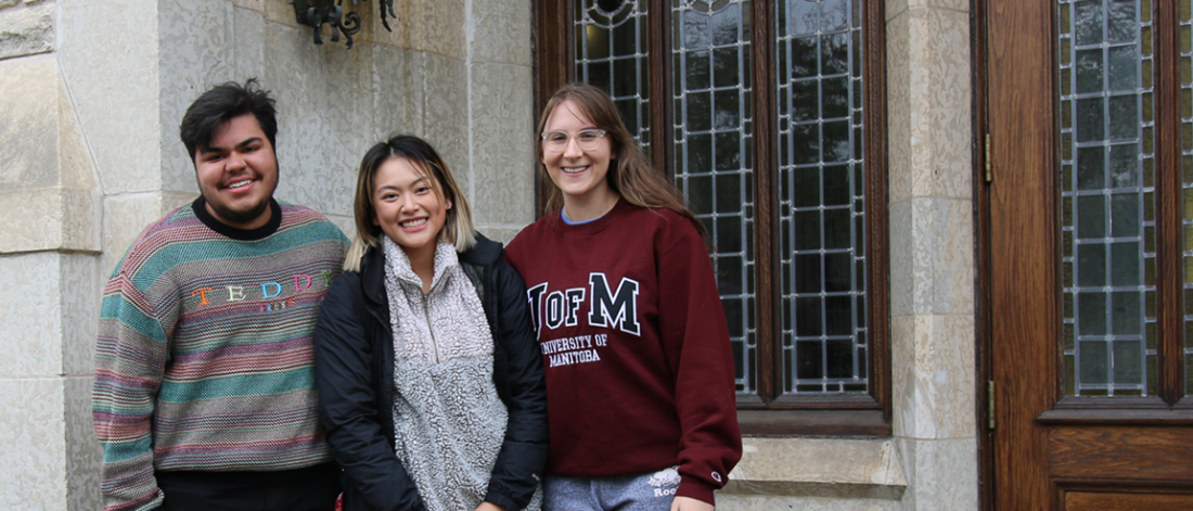 Photo of Alex Rana, Kaylin Lazaro and Amy Spearman, Arts Ambassadors together in front of the Tier building.