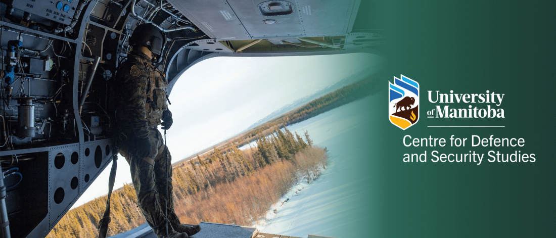 Sergeant Robin Marlow, a CH-147 Chinook Loadmaster with 450 Tactical Helicopter Squadron surveys the area while on a reconnaissance flight during Joint Pacific Multinational Readiness Capability 22-02 at Fort Wainwright, Alaska on March 4, 2022.