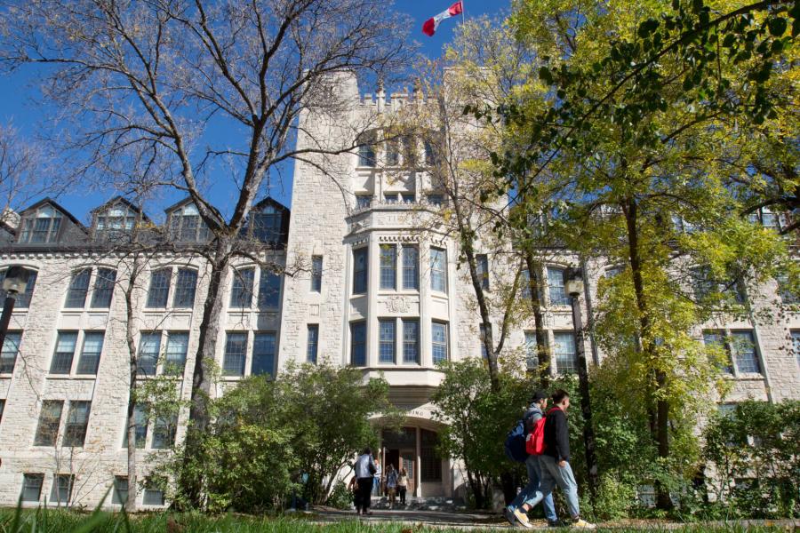 Students walking by the Tier building.