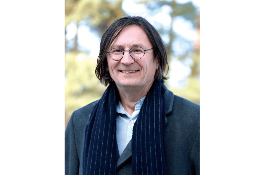 Headshot of Peter Kulchyski standing outside.