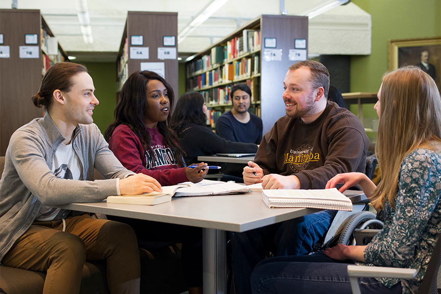 Students having a group study in the library.