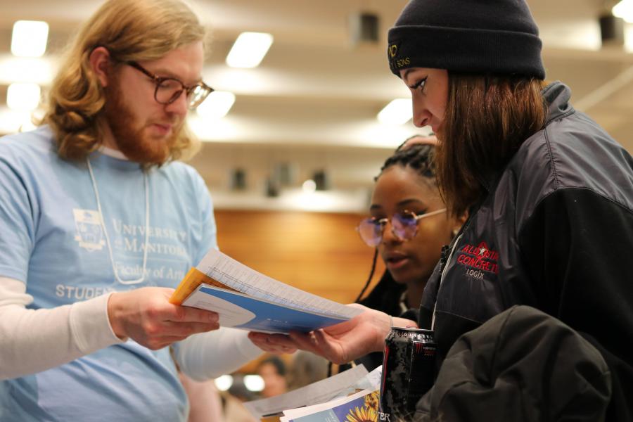 Photo of Arts Ambassador interacting with prospective students.