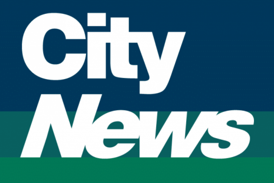 The words City News on a blue and green background.