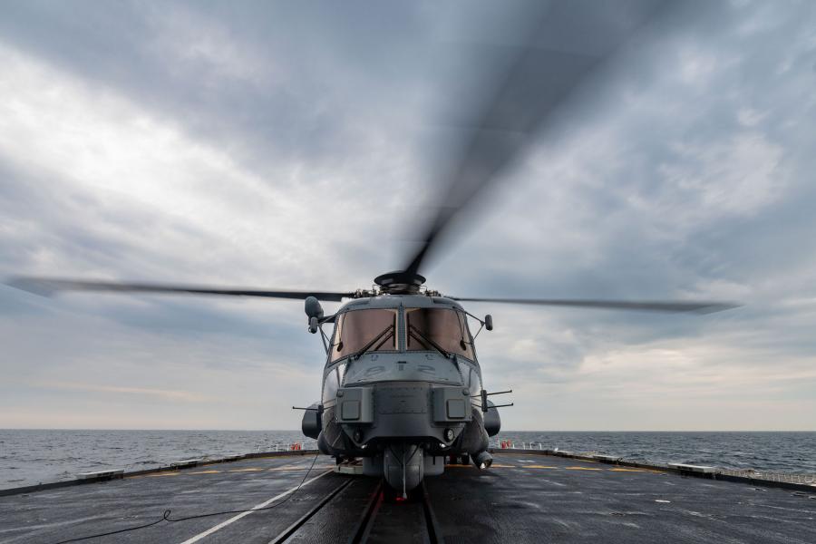 A CH-148 Cyclone prepares to take off from the flight deck of HMCS HALIFAX during Operation REASSURANCE on 16 May 2022.
