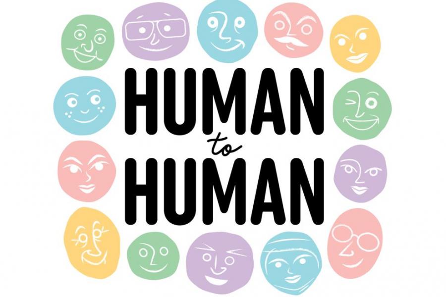 Words human to human surrounded by emoji style faces in various pastel colours.