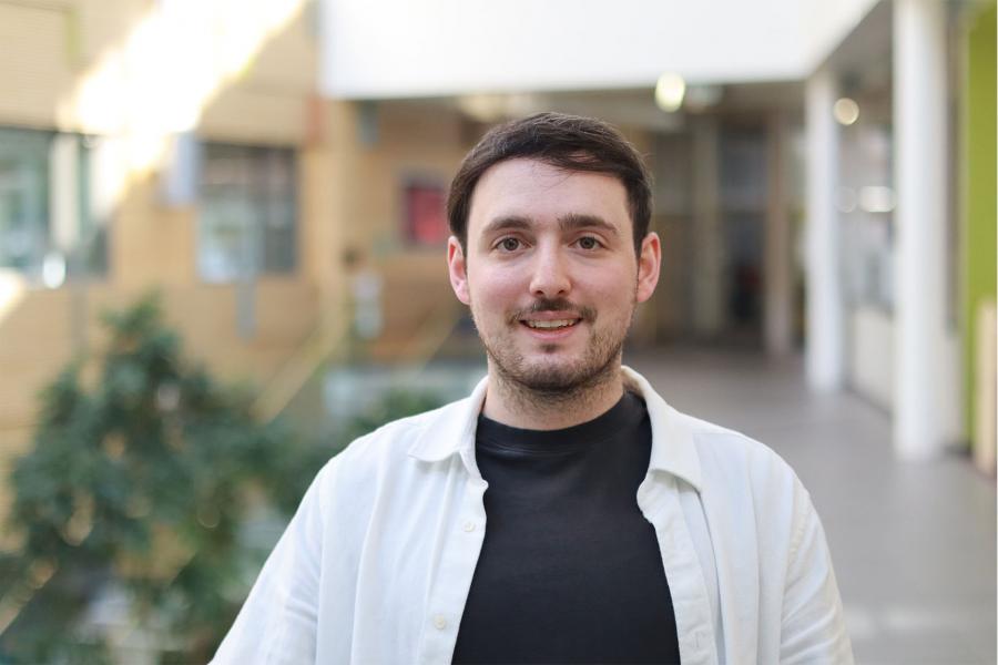 A headshot of Sebi Szpajze 