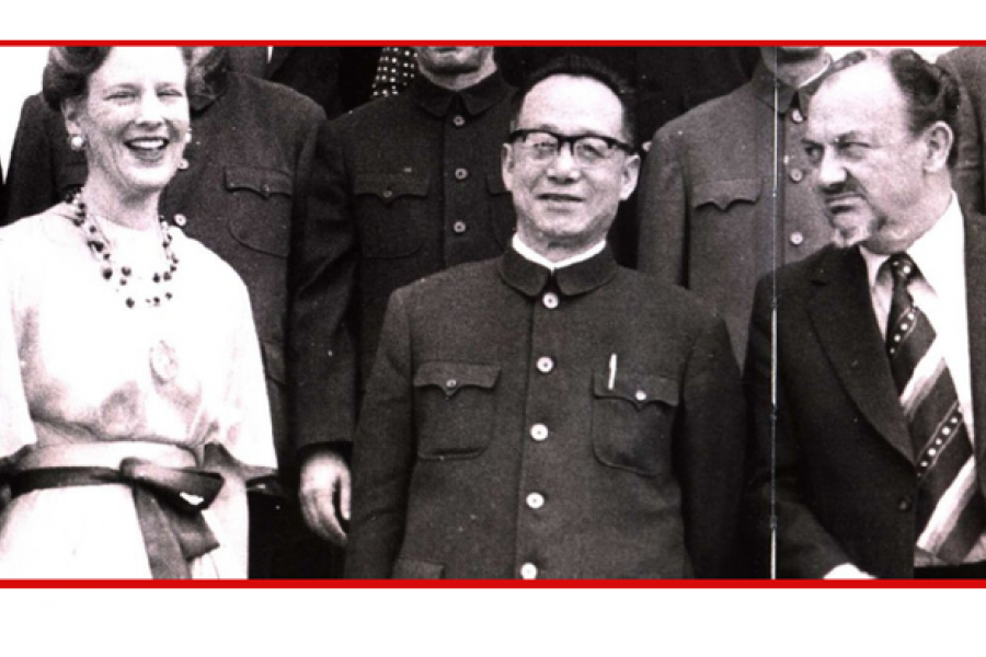 A black and white photo of three people from approximately the 1970's.