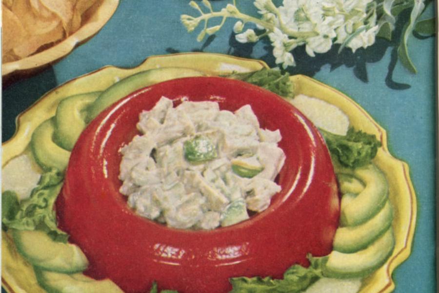 Seafood salad in a tomato aspic bowl.